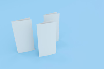 Blank white two fold brochure mockup on blue background