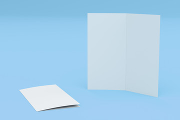 Blank white two fold brochure mockup on blue background