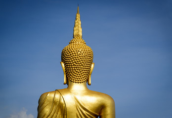 The back side of golden Buddha statue.