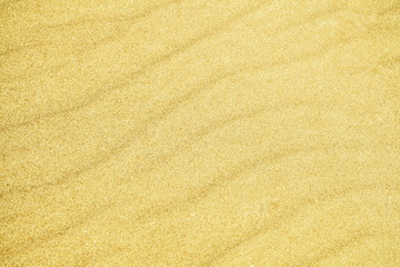 Fototapeta na wymiar Sea sand in yellow