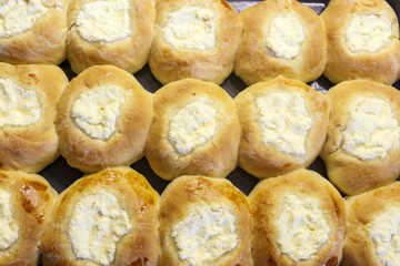 Round Russian scones with cottage cheese - vatrushka. Traditional Russian baking.