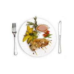 Grilled meat ribs with potatoes top view isolated