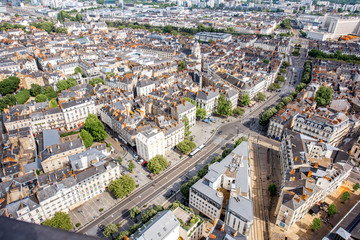 Aerial cityscape view with beautiful buildings and in Nantes city during the sunny weather in France