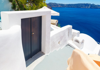 Traditional greek door with a great view on Santorini island, Greece