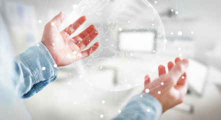 Businessman holding global network on planet earth 3D rendering