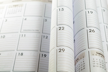 Blurred and focused folded calendar pages