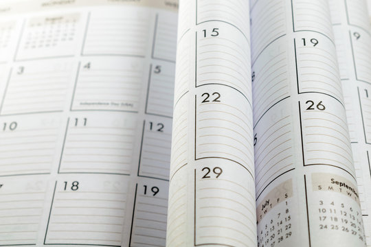 Blurred and focused folded calendar pages