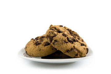 Chocolate cookies on a small dish. Still-life picture taken in studio with white background and soft-box.