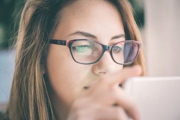 Young woman is surfing the net.