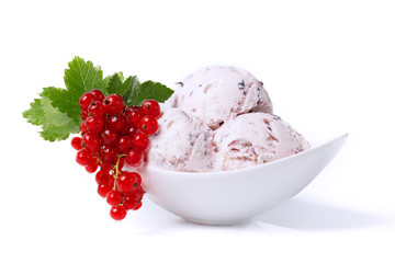 Italian Ice cream scoops with pieces of red currant berries closeup. Homemade dessert in porcelain saucer isolated on white.