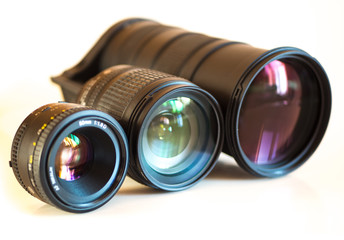 Three camera lenses isolated on white
