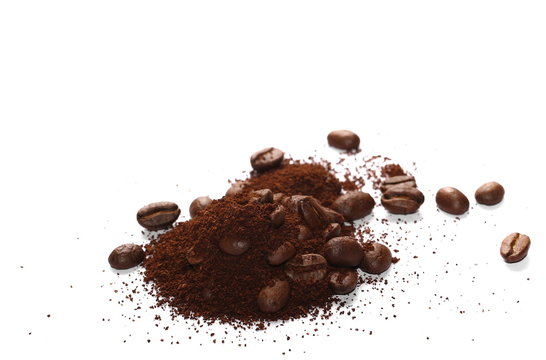 Pile of powdered, instant coffee and beans isolated on white background © dule964