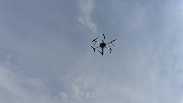 Modern drone is flying. FHD stock footage.