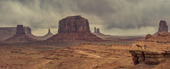 desert landscape with horse in Monument Valley, USA © Belikova Oksana