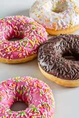 close-up view of colorful donuts