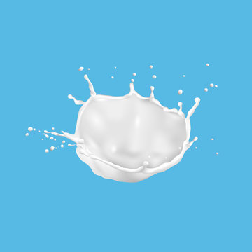 Milk splashes isolated on blue background