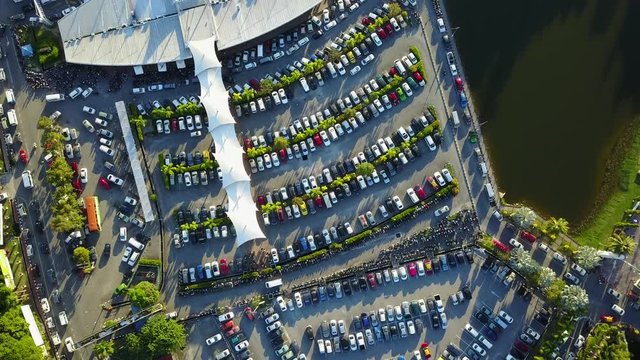 Automobile parking lot on the Langkawi pier, aerial view from the drone