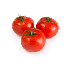 Red fresh tomatoes on a white isolated background