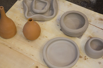 Master skulpturing a clay pot, potter hands, crafting concept