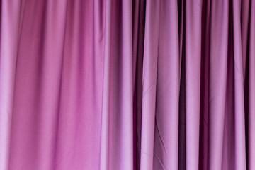 Purple cloth on the curtain as a background