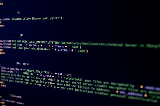 Ransomware source code with notice asking money in Bitcoin to decrypt files. Malicious script source code that encrypts the files on the victim's pc. Code lines of important software for cybersecurity