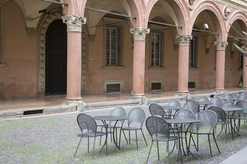 Cafe Table and Chairs with Portico; Santo Stefano Street; Bologna