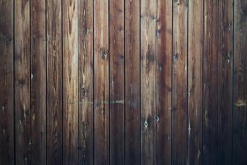 Naklejka premium Tło ciemnobrązowe deski drewniane, ogólny widok.