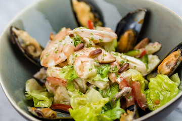 Seafood salad with shrimps, calamari and mussels
