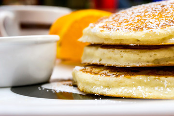 delicious pancake stack with honey