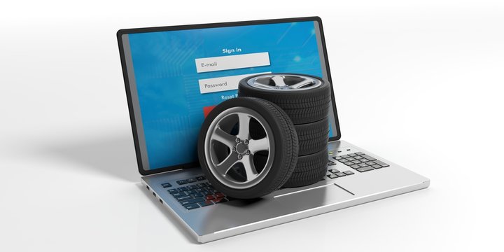 Car Tires And Rims On A Laptop - White Background. 3d Illustration