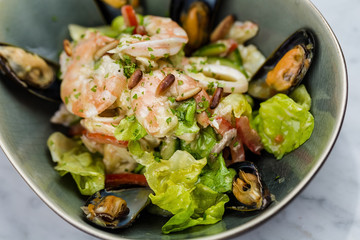 Seafood salad with shrimps, calamari and mussels