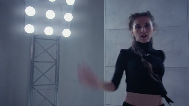 Female dancer in Vogue and Waacking dance style