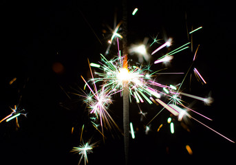 Colorful sparkler at night