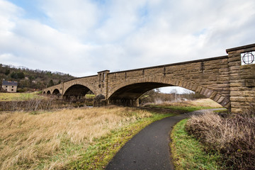 Fototapeta premium Stone bridge over the river
