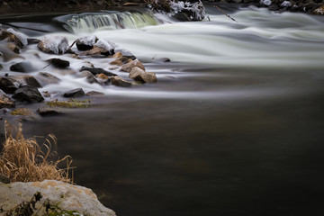 Water flows through boulders