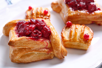 Tasty puff pastry dessert on plate
