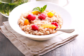 Porridge with apricot and raspberry