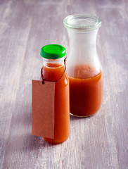 Homemade gooseberry ketchup in a bottle