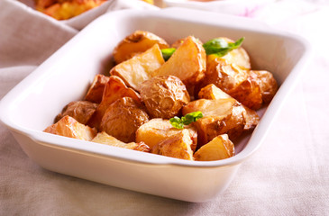 Roast potatoes in a tin