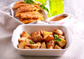 Roast potatoes in a tin