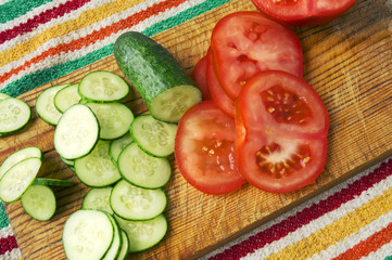 Raw Green Healthy Organic Cucumbers and Tomatoes Ready for Cooking