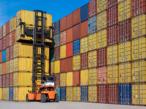 Empty container handler pick up the empty container from stacking yard.