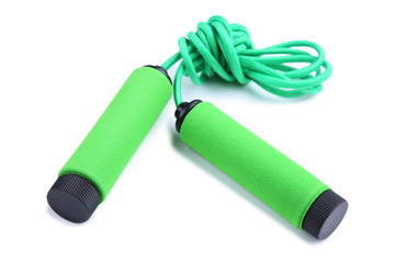 Green skipping rope isolated on a white background