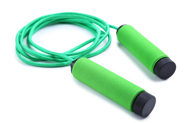 Green skipping rope isolated on a white background