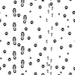 Black prints of human feet and dog paws seamless.