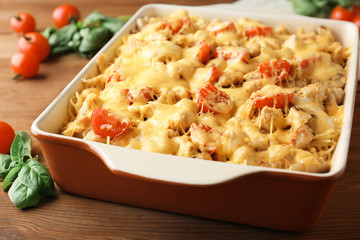 Delicious roasted turkey tetrazzini in baking dish on kitchen table