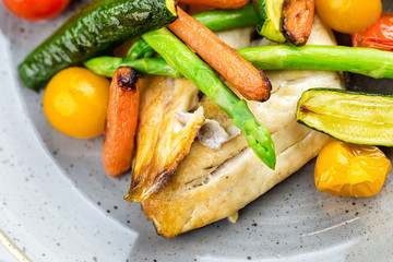 Grilled fish and vegetables with sauce