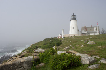 Fototapeta na wymiar Pemaquid Point Lighthouse on a Foggy Morning