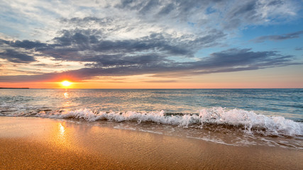 Fototapeta na wymiar Dramatic Tropical Sunrise at the beach