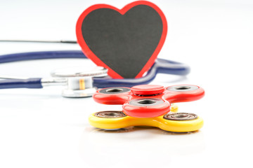 Fidget spinner with autistic therapy concept